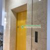 ốp mặt tiền cầu thang máy đá Vàng Ai Cập