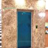 đá nâu tây ban nha ốp mặt tiền thang máy