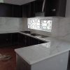 Mẫu bàn bếp đá Trắng Sứ Vân Mây